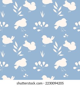 Silhouettes of birds and leaves on a blue background. Pattern in vintage style. Texture for fabric, textile, wallpaper.