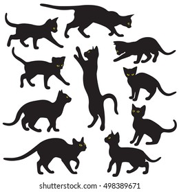 Silhouettes of black cats with yellow eyes isolated on a white background. Vector illustration.
