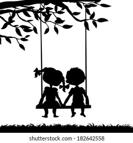 Silhouettes of a boy and a girl sitting on a swing