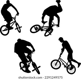 silhouettes of boy on BMX bike