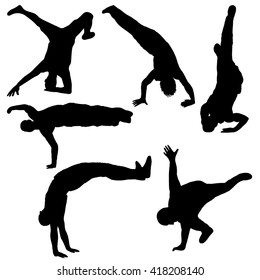 silhouettes of breakdancers