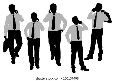 Silhouettes of Business men Walking and speaking mobile phone