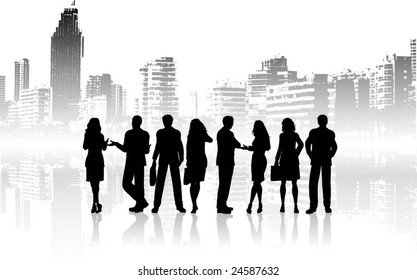 Silhouettes of business people against grunge city background