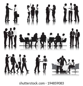 Silhouettes of Business People in a Row Working