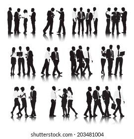 Silhouettes of Business People in a Row Working