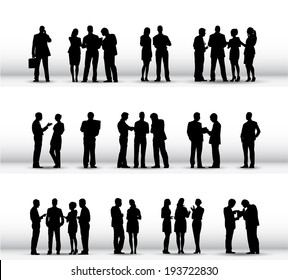 Silhouettes of Business People Working in a Row