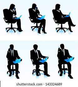 Silhouettes of businessmen with computers