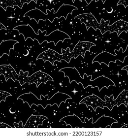 Silhouettes of cartoon bats on a black background. Seamless pattern