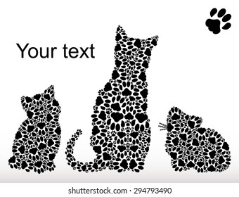 Silhouettes of a cat and two kittens from cat traces