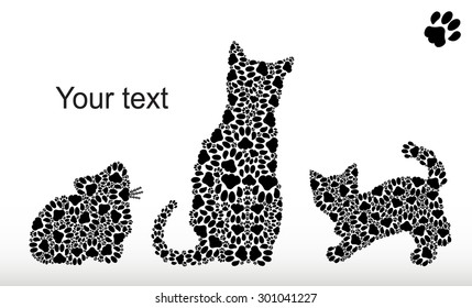 Silhouettes of a cat with two kittens from cat traces