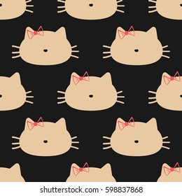 Silhouettes of a cat's head with a bow. Seamless pattern. Vector illustration.