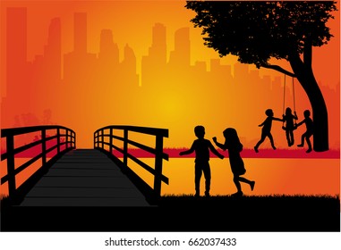 Silhouettes of children playing.