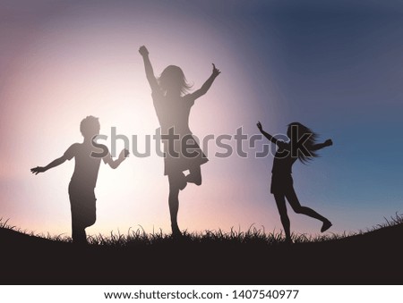 Silhouettes of children playing against a sunset sky