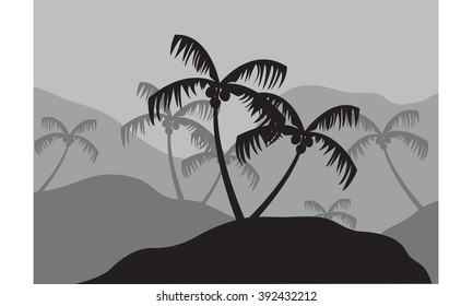 Silhouettes of coconut tree on the mountain