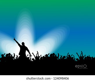 Silhouettes of concert crowd