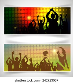 Silhouettes of concert crowd, banner set