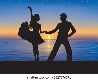 Silhouettes of couple dancing. Sunset on the background. 