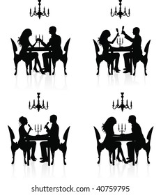 Silhouettes of couples having a romantic dinner.