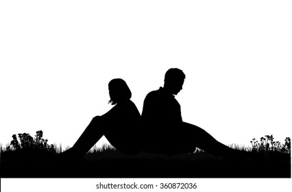 Silhouettes of couples. Resting on the grass.