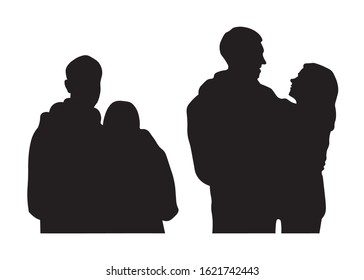 Silhouettes of a crowd, group of people, family, boyfriend and girlfriend, tourists, couple on vacation. Vector black silhouette isolated on the white background. The couple embrace each other. Hugs.