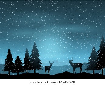 Silhouettes of deer in a winter landscape