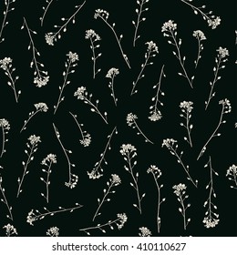 Silhouettes of delicate forget me nots flowers pattern background light beige on black