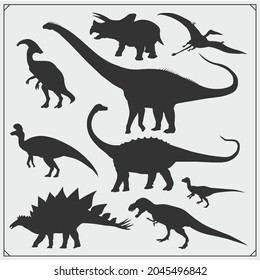 Silhouettes of dinosaurs. Vector monochrome set.