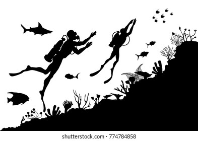 Silhouettes of Divers exploring Underwater reef