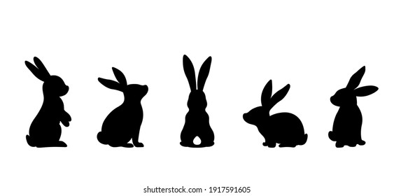 Silhouettes of easter bunnies isolated on a white background. Set of different rabbits silhouettes for design use.