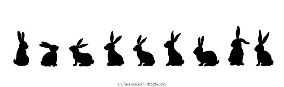 Silhouettes of easter bunnies isolated on a white background. Set of different rabbits silhouettes for design use. - Shutterstock ID 2112428651