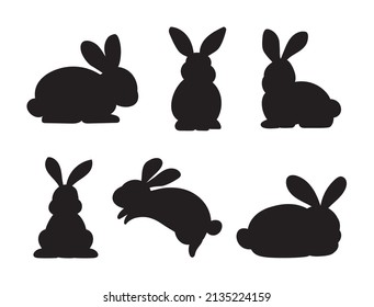 Silhouettes of easter rabbits isolated on a white background. Collection of bunnies flat cartoon.