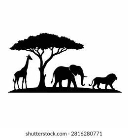 Silhouettes of elephants and a giraffe standing under a large tree at sunset