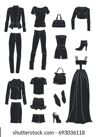 Silhouettes of fashion clothes isolated on white background