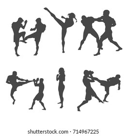 Silhouettes of fighting people