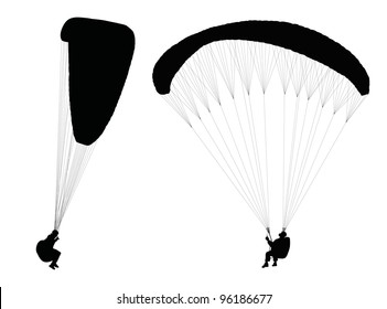 Silhouettes of flying paragliders. Vector