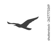 Silhouettes of flying seagulls hovering without background