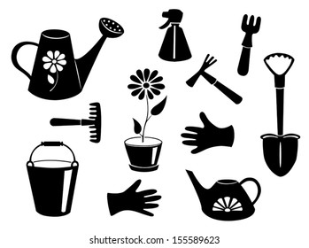 Silhouettes of garden tools. Vector illustration. Isolated on white.
