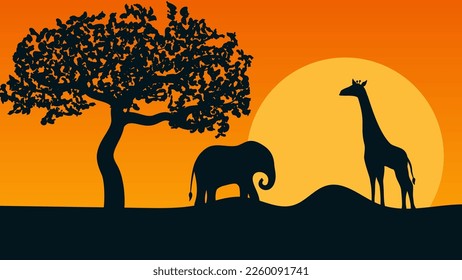 silhouettes of giraffe, elephant and tree at vivid orange sunset in savanna