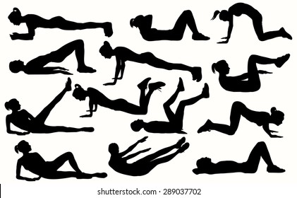 Silhouettes of a girls doing a fitness exercises