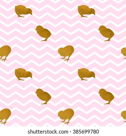 The silhouettes of gold chicks on chevron background. Seamless pattern for Easter greeting card, print and web design.