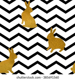 The silhouettes of gold rabbits on chevron background. Seamless pattern for Easter greeting card, print and web design.