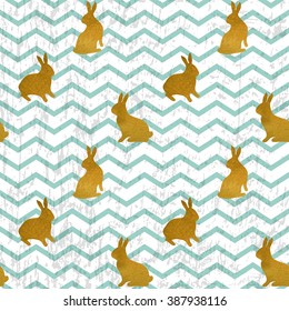 The silhouettes of gold rabbits on grunge chevron background. Seamless pattern for Easter greeting card, print and web design.