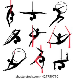  Silhouettes of a gymnastic girl. Vector illustrations set on white background