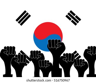 silhouettes hand compressed in a fist against the background of the flag of South Korea. symbol of protest for the resignation of President.