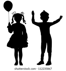 Silhouettes of happy kids - girl and boy