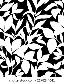 Silhouettes of leaves seamless pattern. beautiful allover Vector illustration, white leaves and branches on a black background.