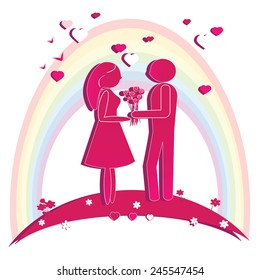Silhouettes of a loving couple standing in front of the rainbow and the sky