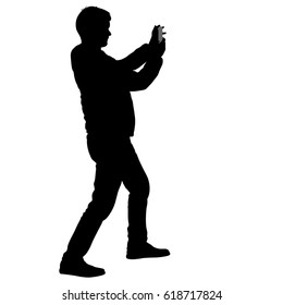 Silhouettes man taking selfie with smartphone on white background.