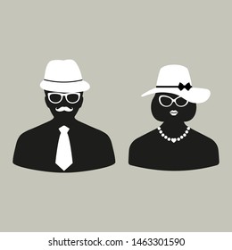 silhouettes of man and woman in hat and glasses on gray background