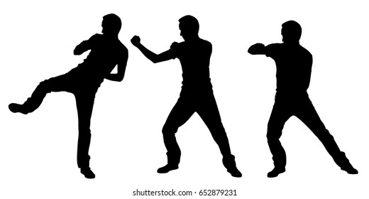 silhouettes of men fighting isolated